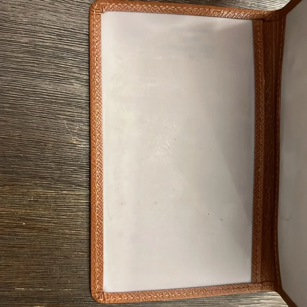 Authentic Louis Vuitton brown taiga leather bifold card I.D. Holder